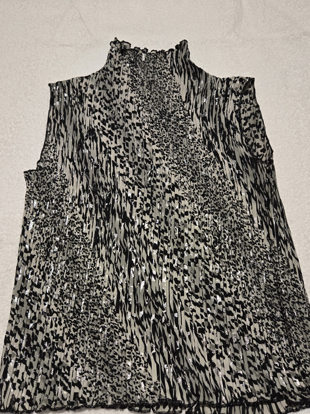 Sleeveless High Neck Top in Black and White Textured Print.  Accordion Pleated